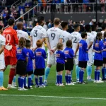 Why Do Soccer Players Walk Out with Children?